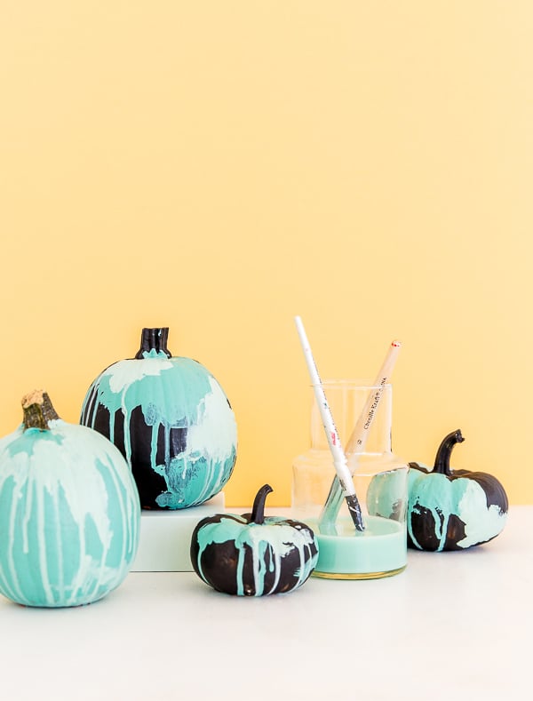 watercolor painted halloween pumpkins with yellow background