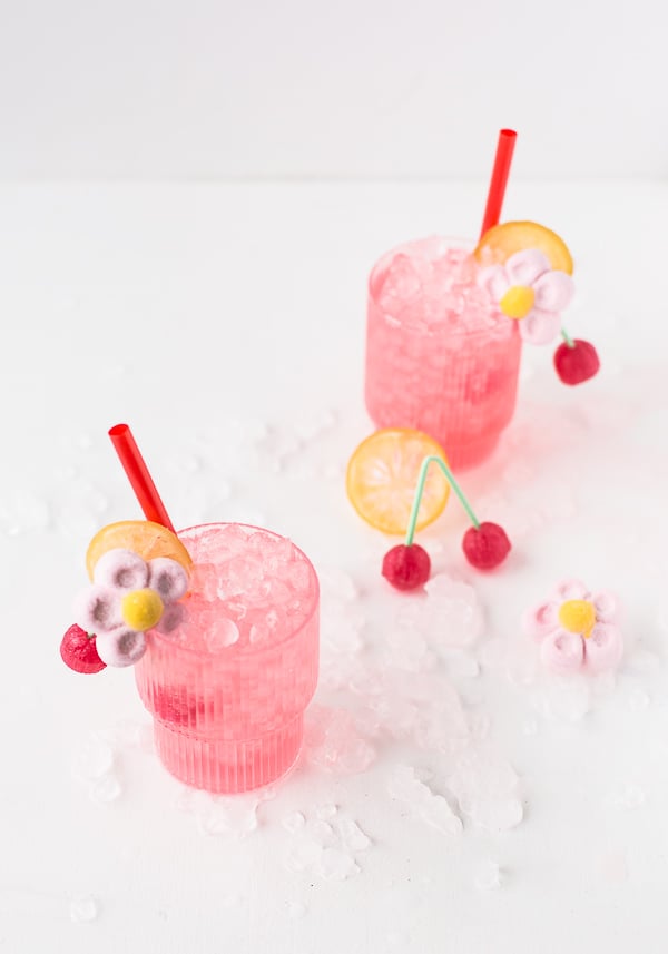Spiked cherry lemonade cocktails. A little sweet, a little sour, and delicious! Click through for the recipe. #cocktail #cocktailrecipe #pink #valentinesday #valentine #candycocktail