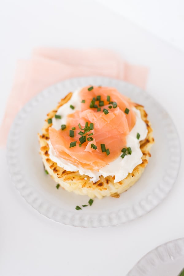 Savory hash brown nests 3 ways at your next brunch (this one is salmon, chives, and cream cheese). Click through for the recipe! #breakfast #brunch #recipe #hashbrowns #uniquehashbrown