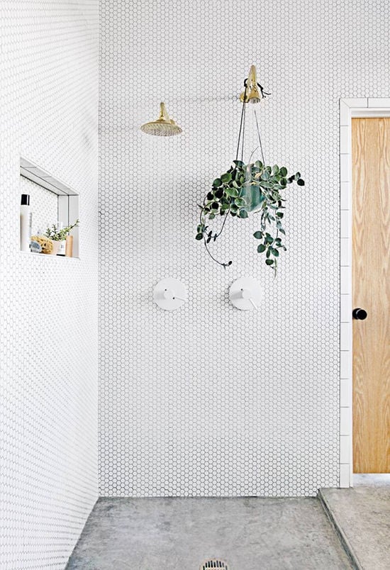 13 Ideas for What to Do With That Weird Space Above Your Toilet