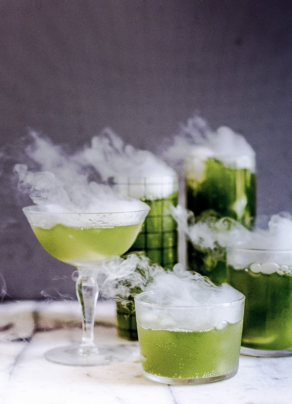 green spooky cocktails for halloween with dry ice