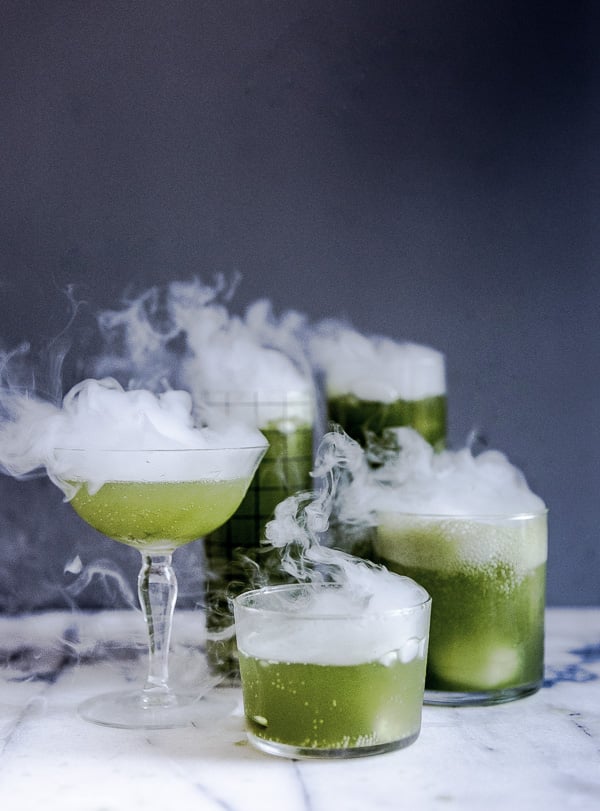Green dry ice cocktails smoking over for Halloween