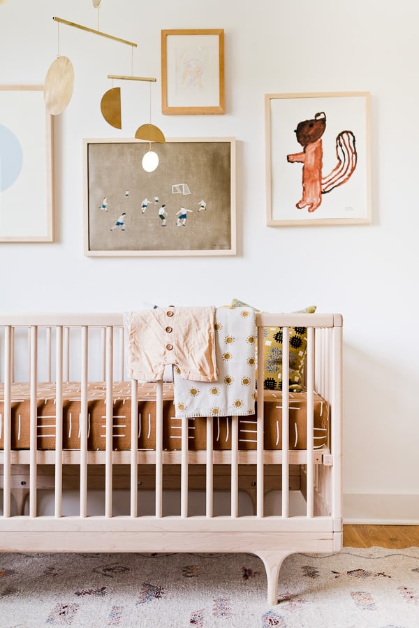An organic modern nursery makeover. Click through for the full reveal (with before and after photos). #nursery #organicmodern #interiorhomedecor #roommakeover #babyroom