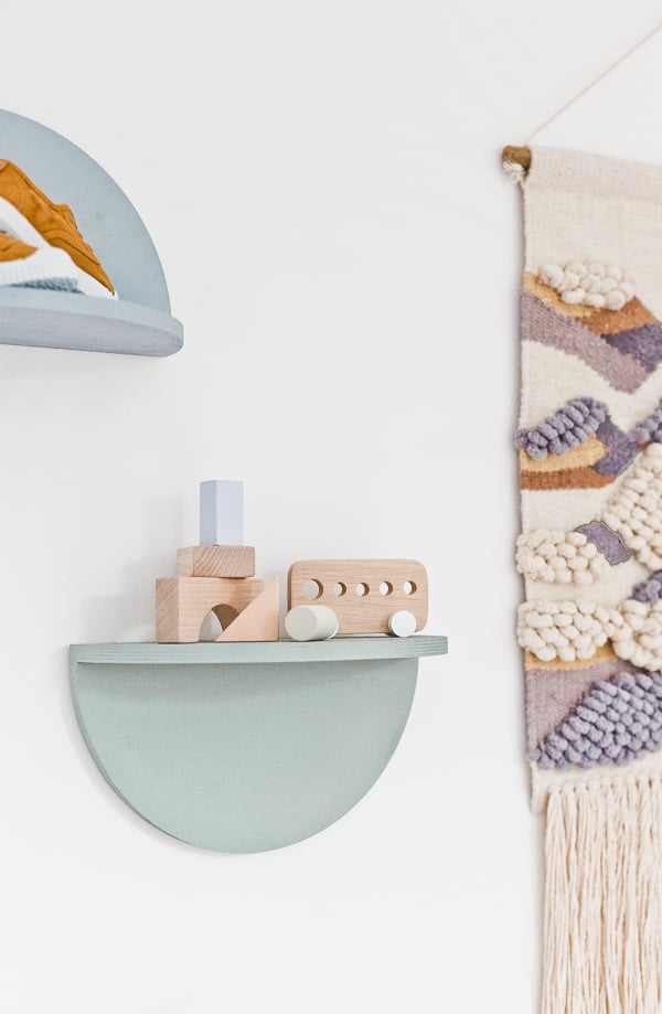 A Unique DIY Shelving Idea: How to Make Wood Half Circle Shelves. Click through for the tutorial. #diyshelving #diy #diyhome #woodproject #diywoodproject #uniqueshelving #mutedhousewares #diywallart