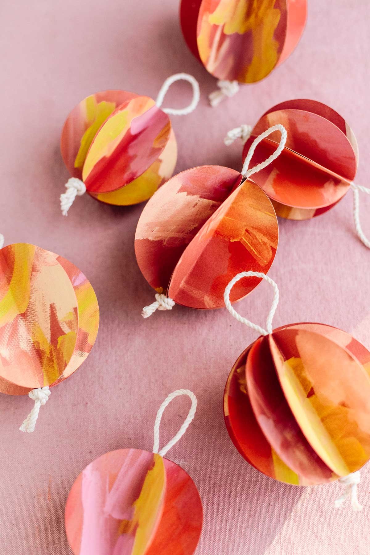 paper balls in red, yellow, and orange for the holidays