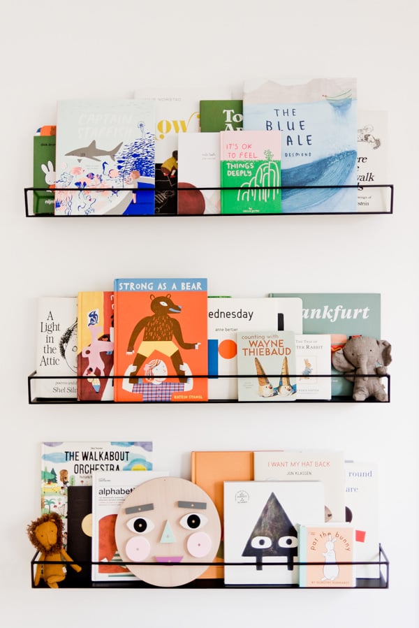 Floating shelves with kids book and toys