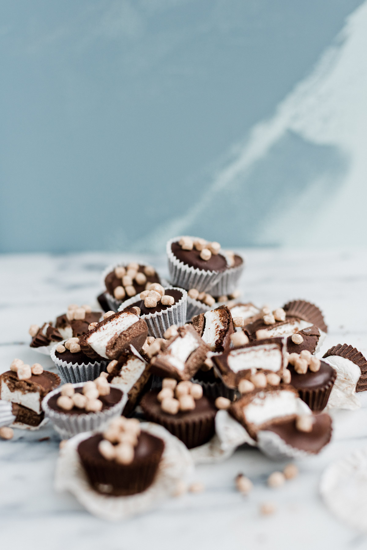 pile of chocolate marshmallow candy cups