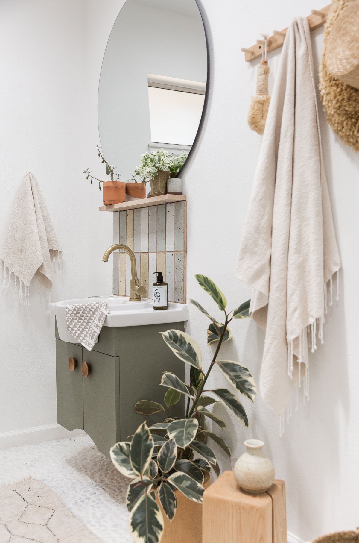https://www.papernstitchblog.com/wp-content/uploads/2022/09/neutral-earthy-bathroom-makeover-on-a-budget-2.jpg?utm_source=chatgpt.com