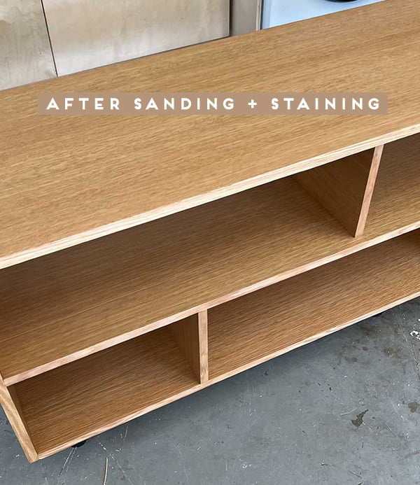 Empty wood bookcase after sanding and staining