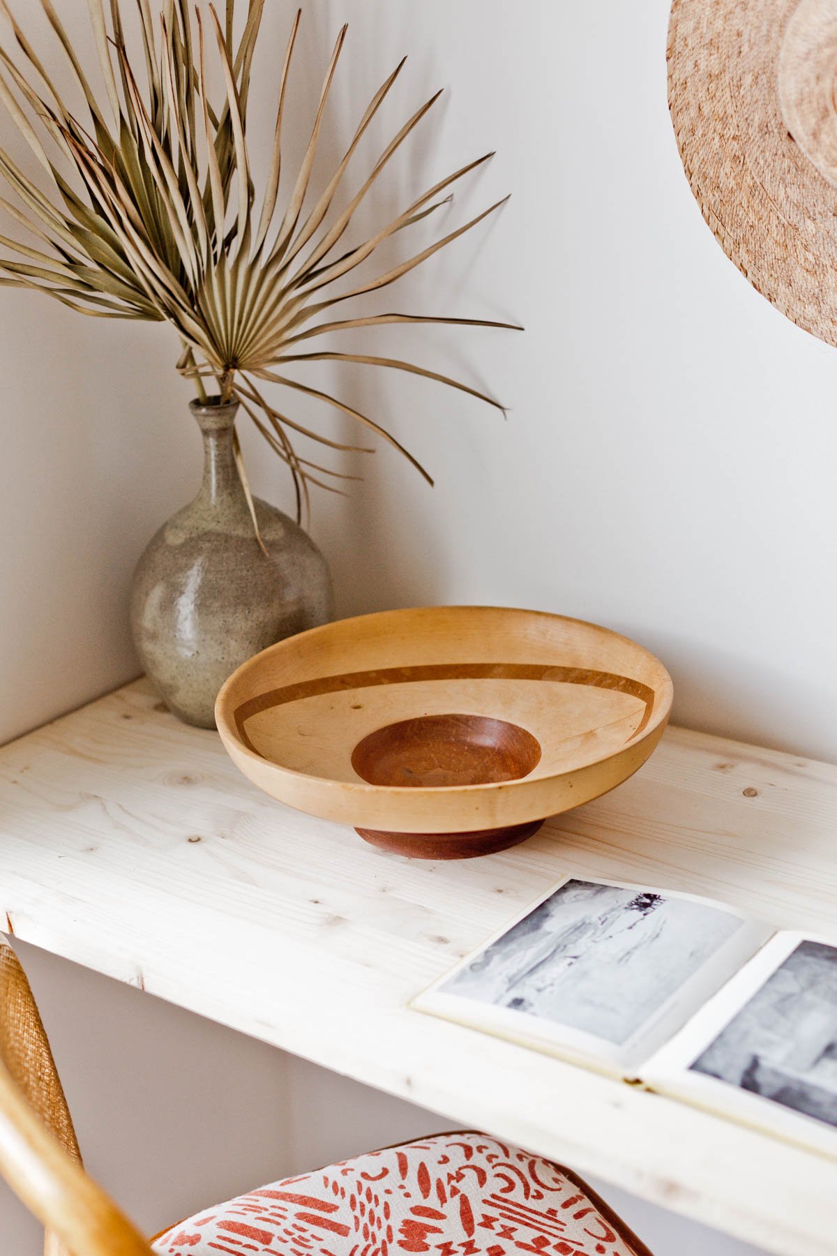 minimal wood desk with book / journal opened on top