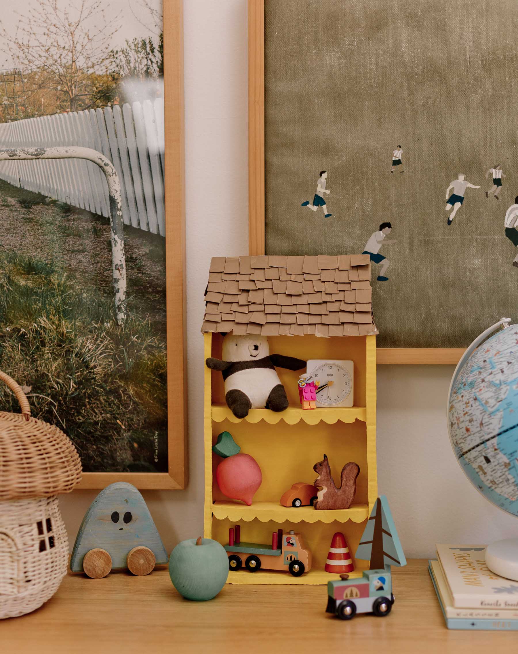 yellow minimal modern dollhouse diy in a kid's room