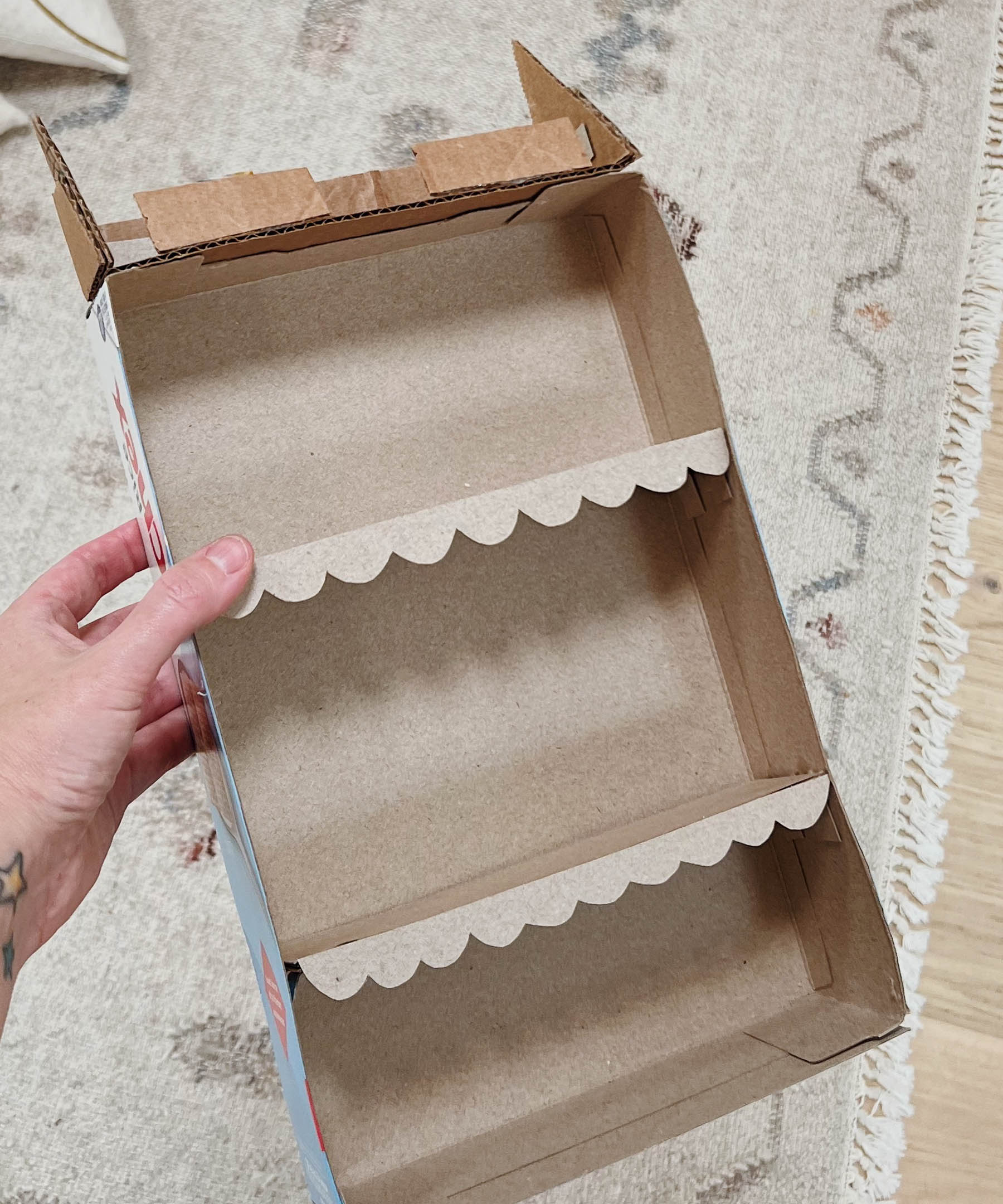 making a dollhouse with a cardboard cereal box