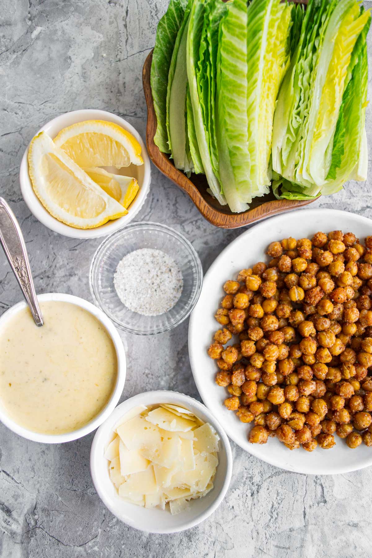 ingredients on grey stone counter for Crispy Chickpea Salad Recipe