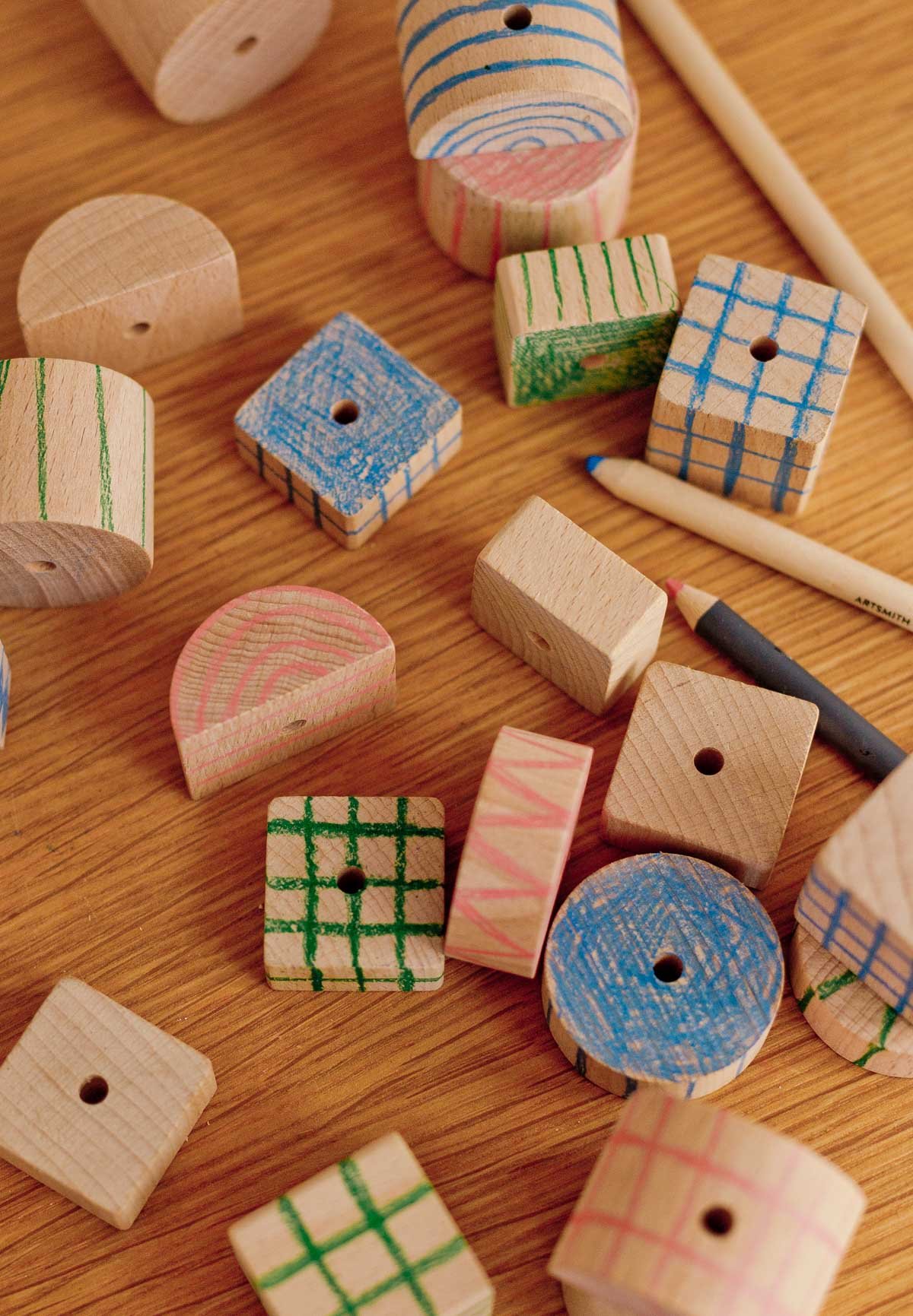 geometric wood blocks in various shapes with simple patterns