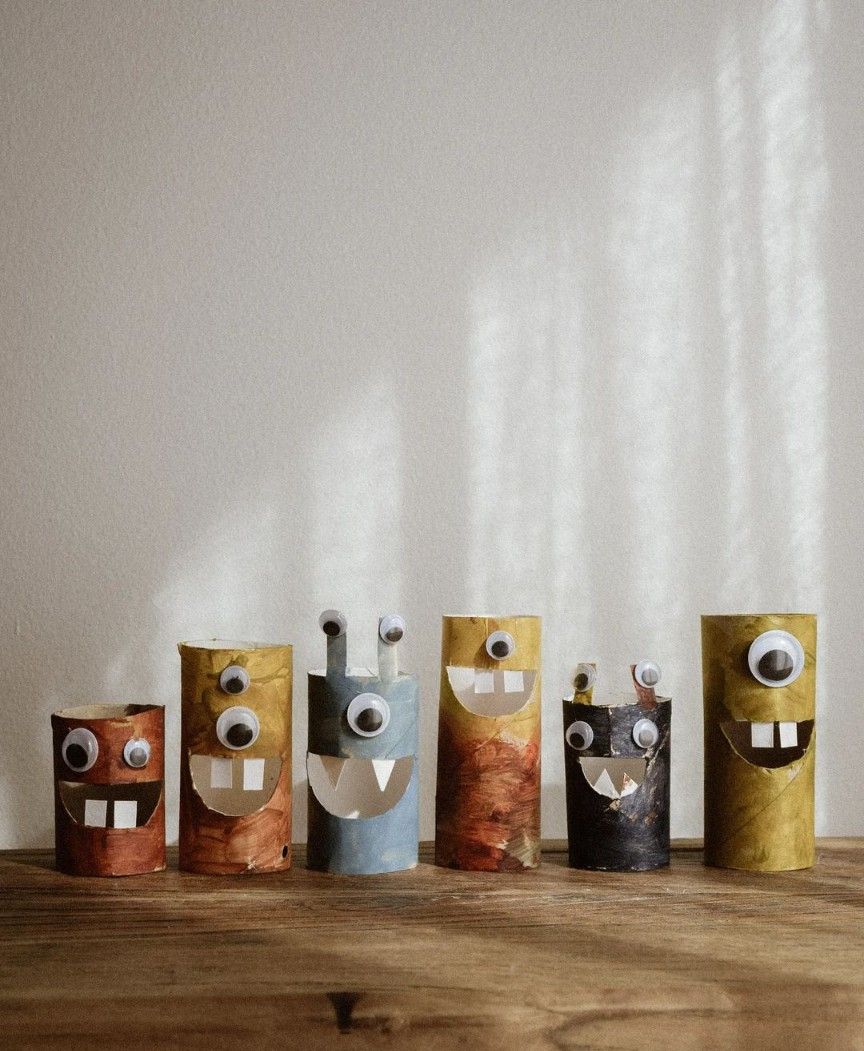 cute kid monster decor made of toilet paper rolls and googly eyes