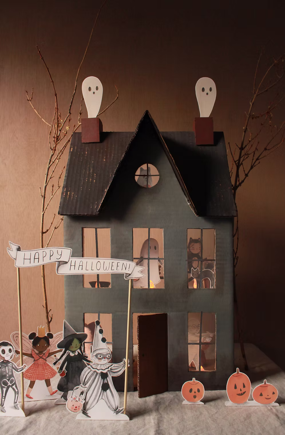 cute cardboard haunted house for halloween with printable trick-ot-treaters
