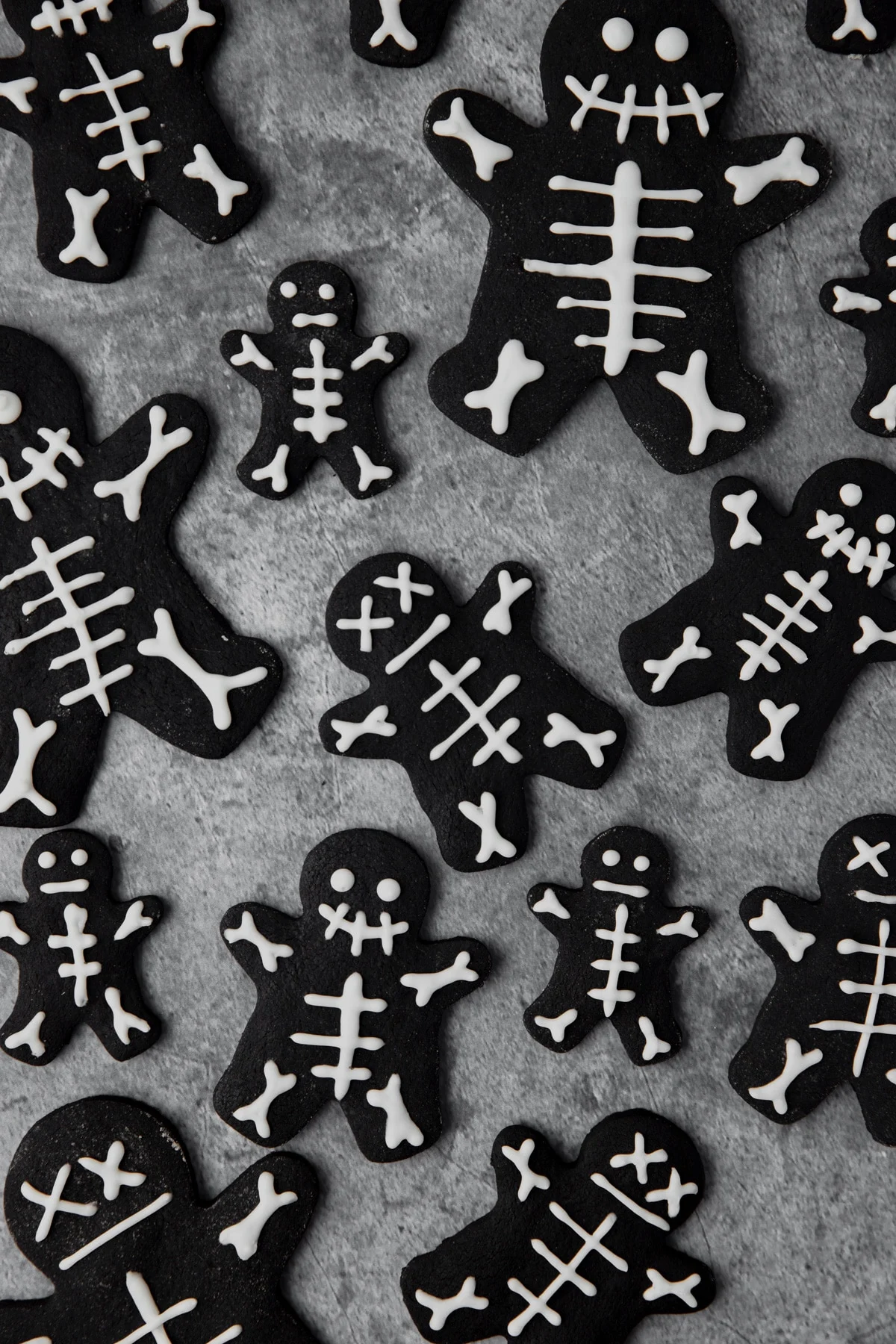 black cocoa skeleton cookies with royal icing decoration