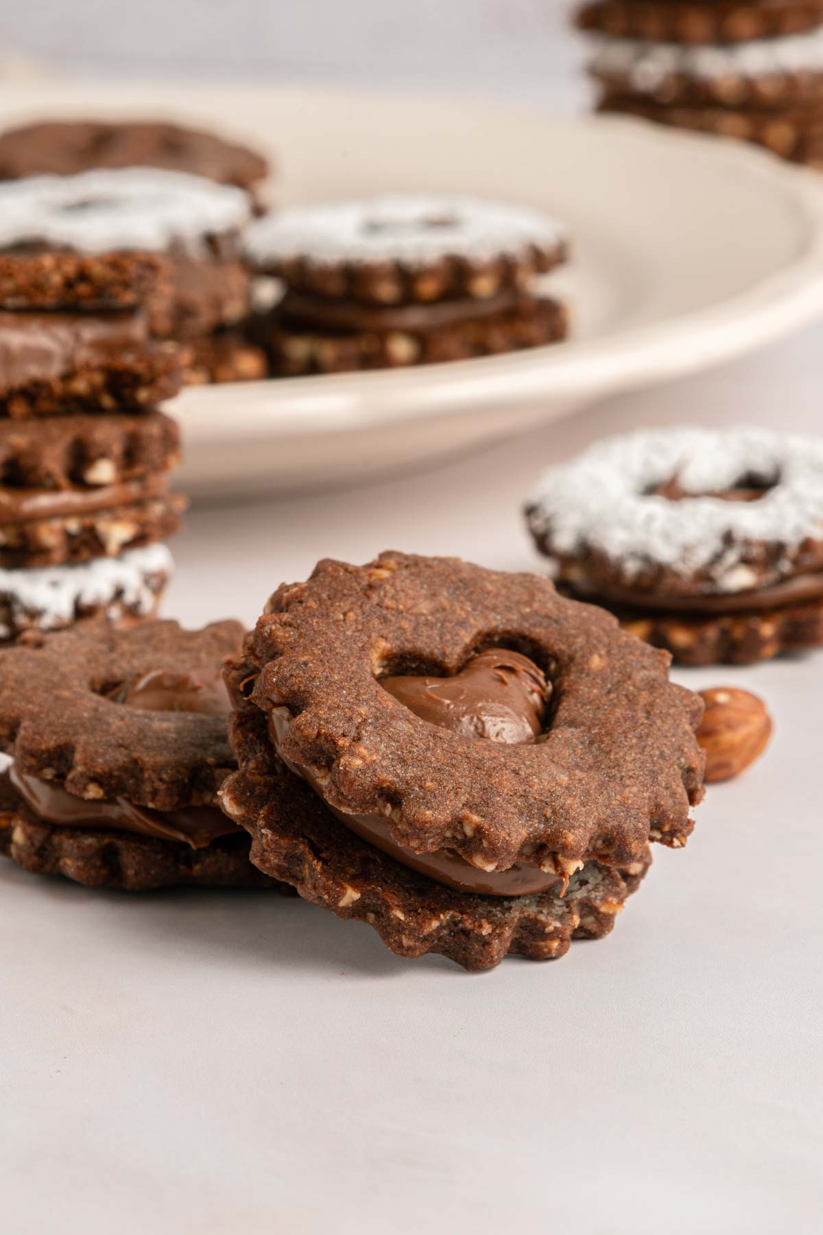 chocolate hazelnut cookies stuffed with nutella, in heart shapes