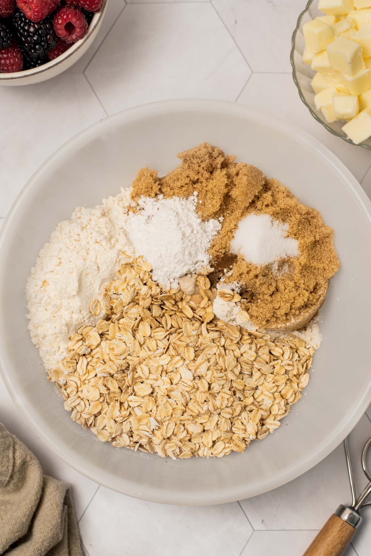 ingreidnts in a bowl reafy to mixed to make shortbread cookie bars