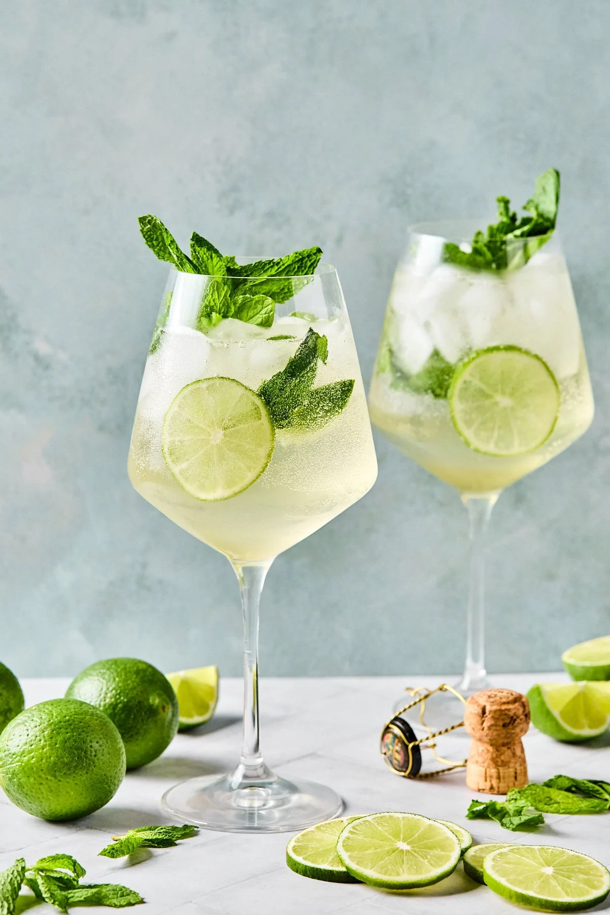 lime drinks in tall wine glasses
