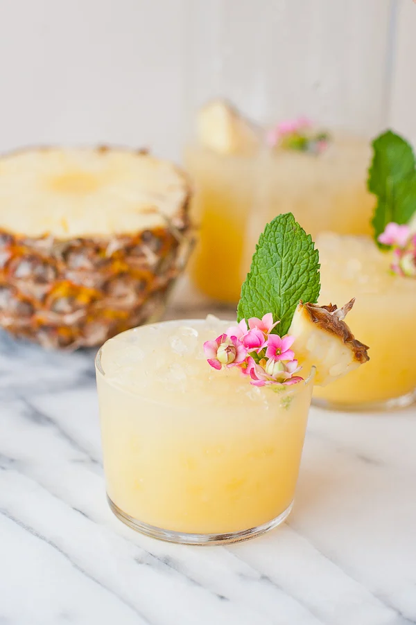 pineapple rum punch in short glasses