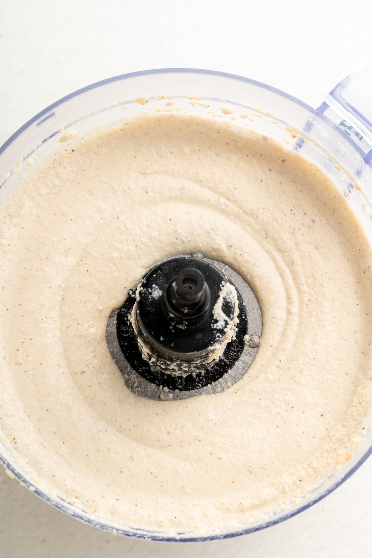 blending ingredients for key lime bar filling in a food processor